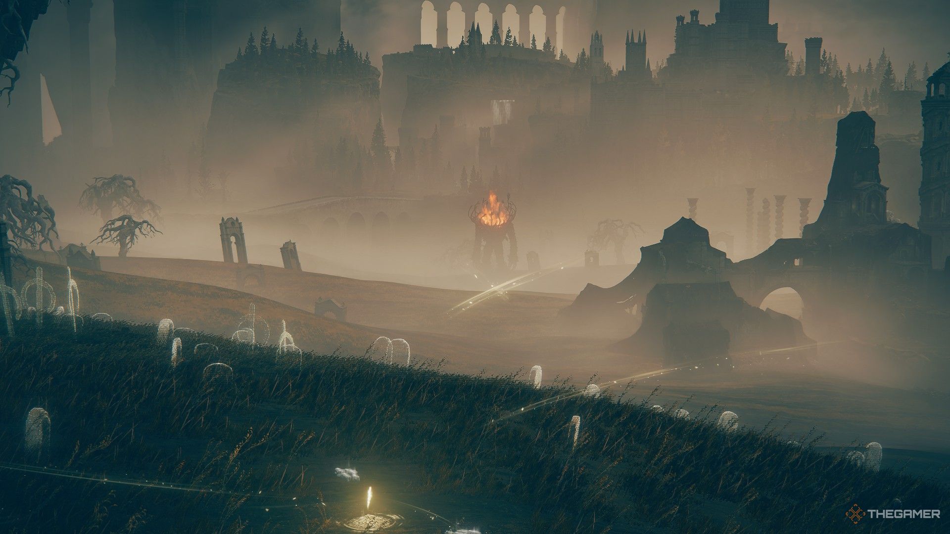 Player looks over the Gravesite Plain to spy the Furnace Golem at the Scorched Ruins in the distance in Elden Ring: Shadow of the Erdtree.