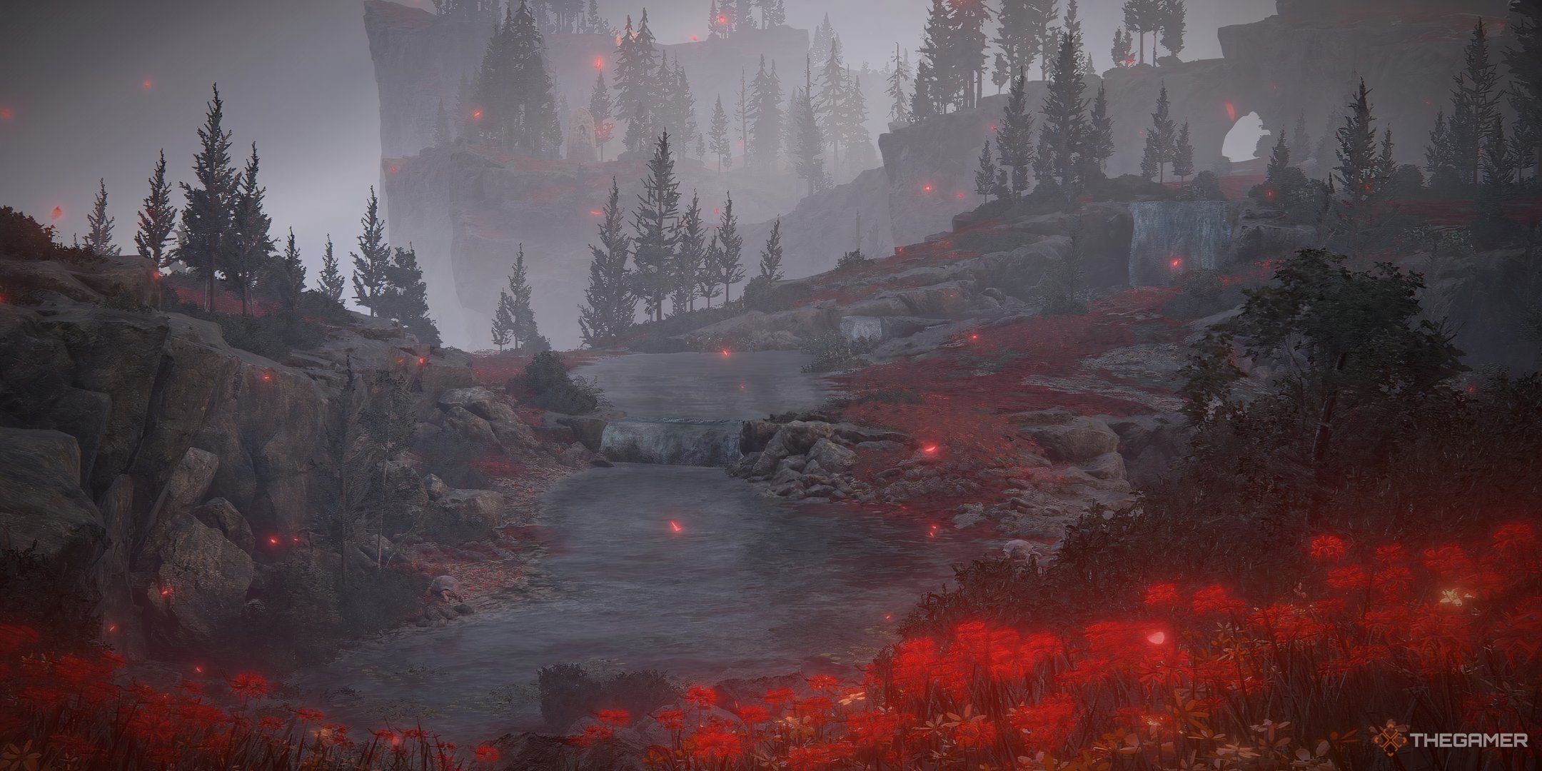 Beauitful landscape of crimson flowers on a muted greyscale background in Charo's Hidden Grave in Elden Ring: Shadow of the Erdtree.